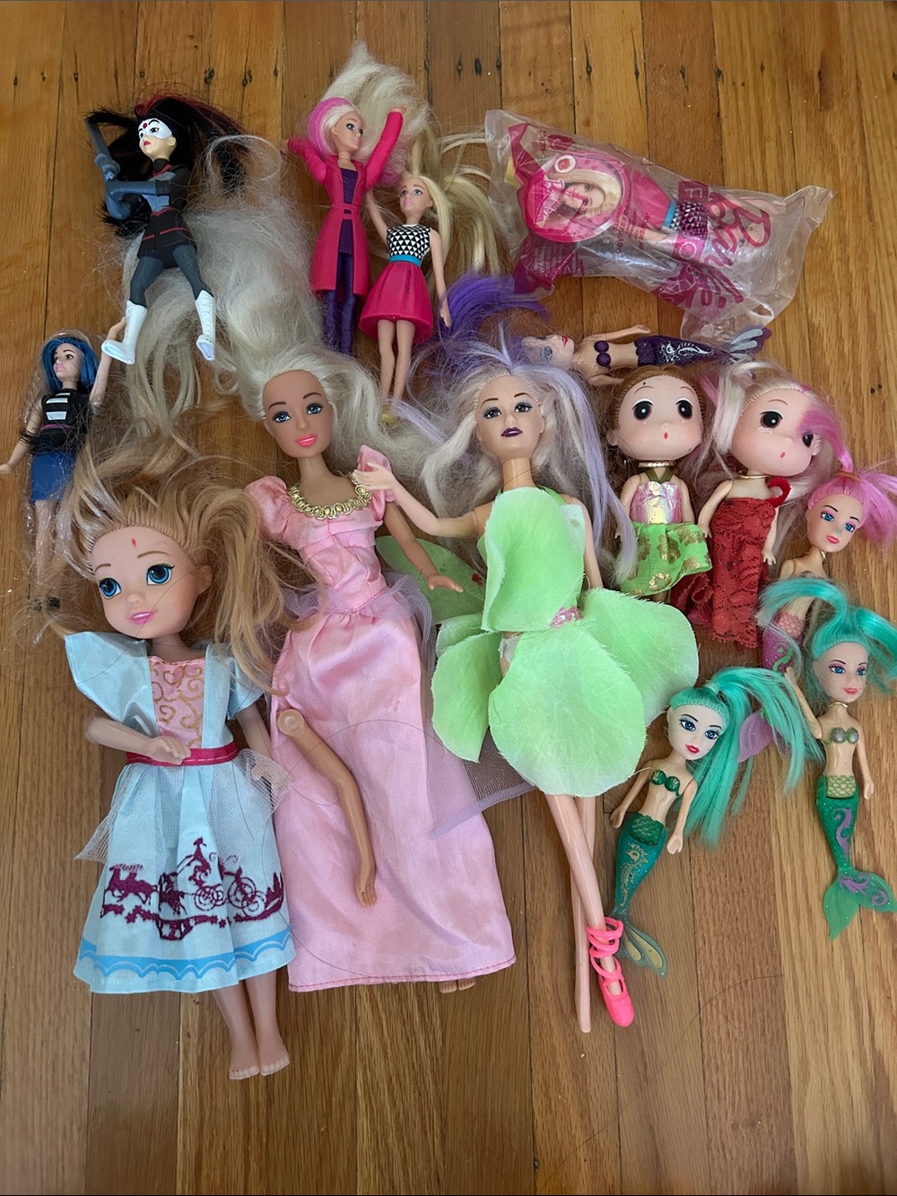 Lot of 14 dolls — Disney princesses, super heroes, barbie, mermaids